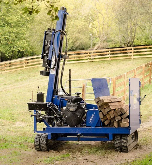 Fence installation equipment loaded with fencing material on a farm