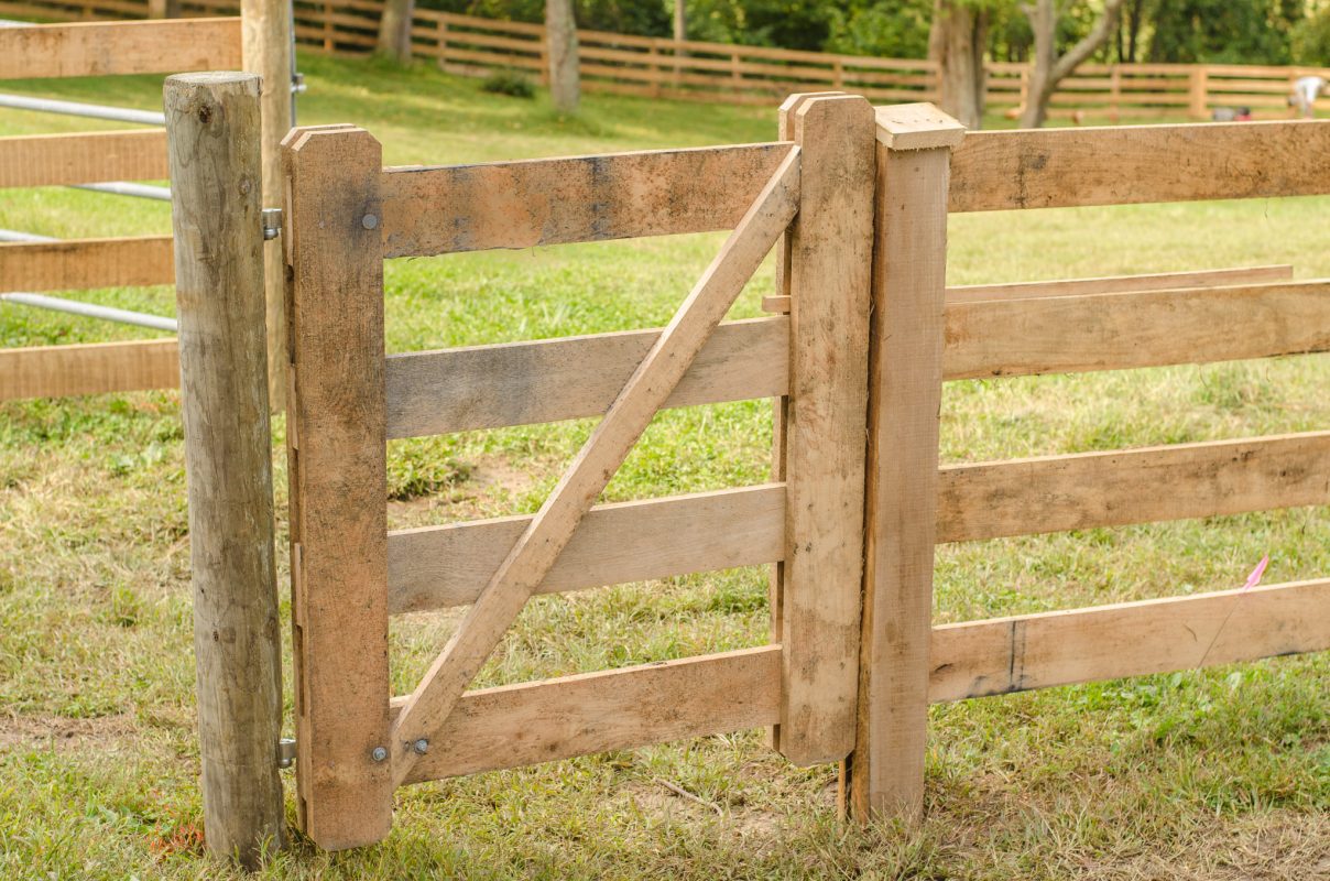 New farm fence installation by Oak and Iron Farm Fence