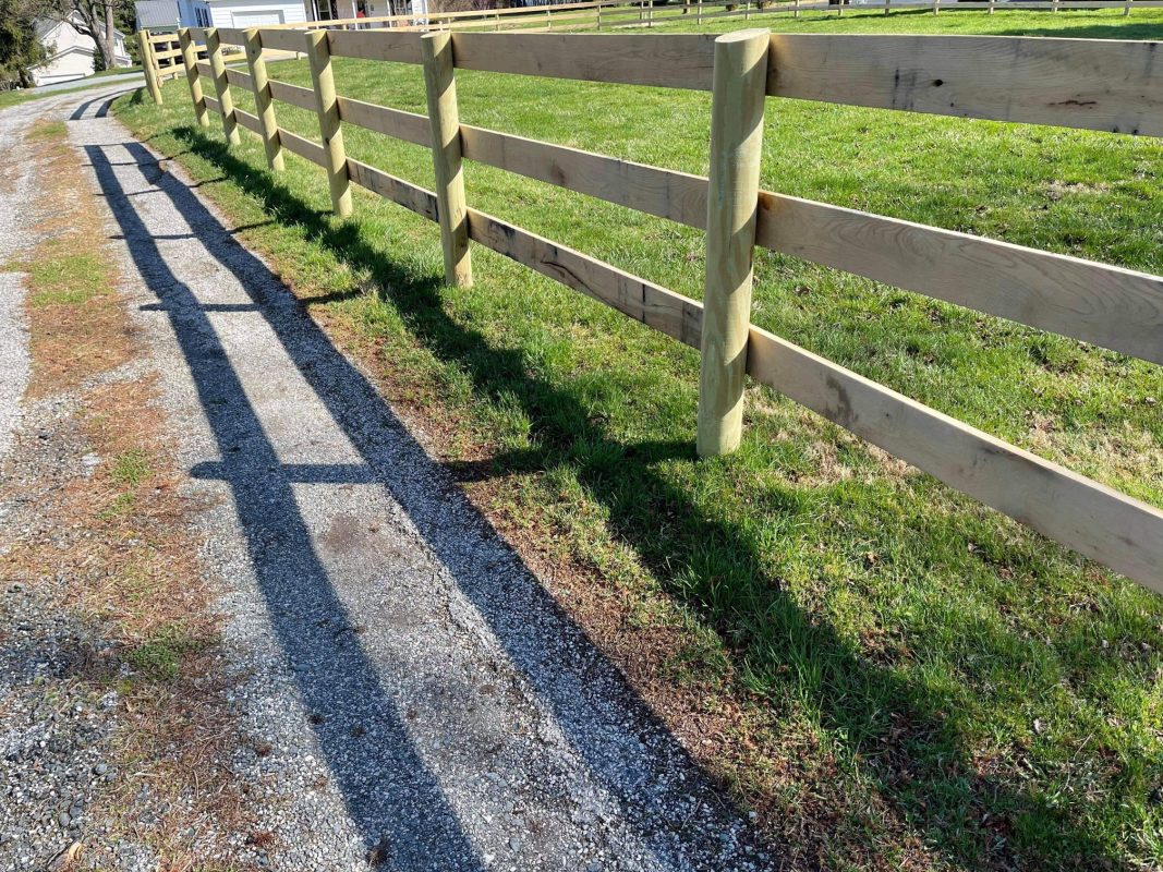 New farm fence installation by Oak and Iron Farm Fence
