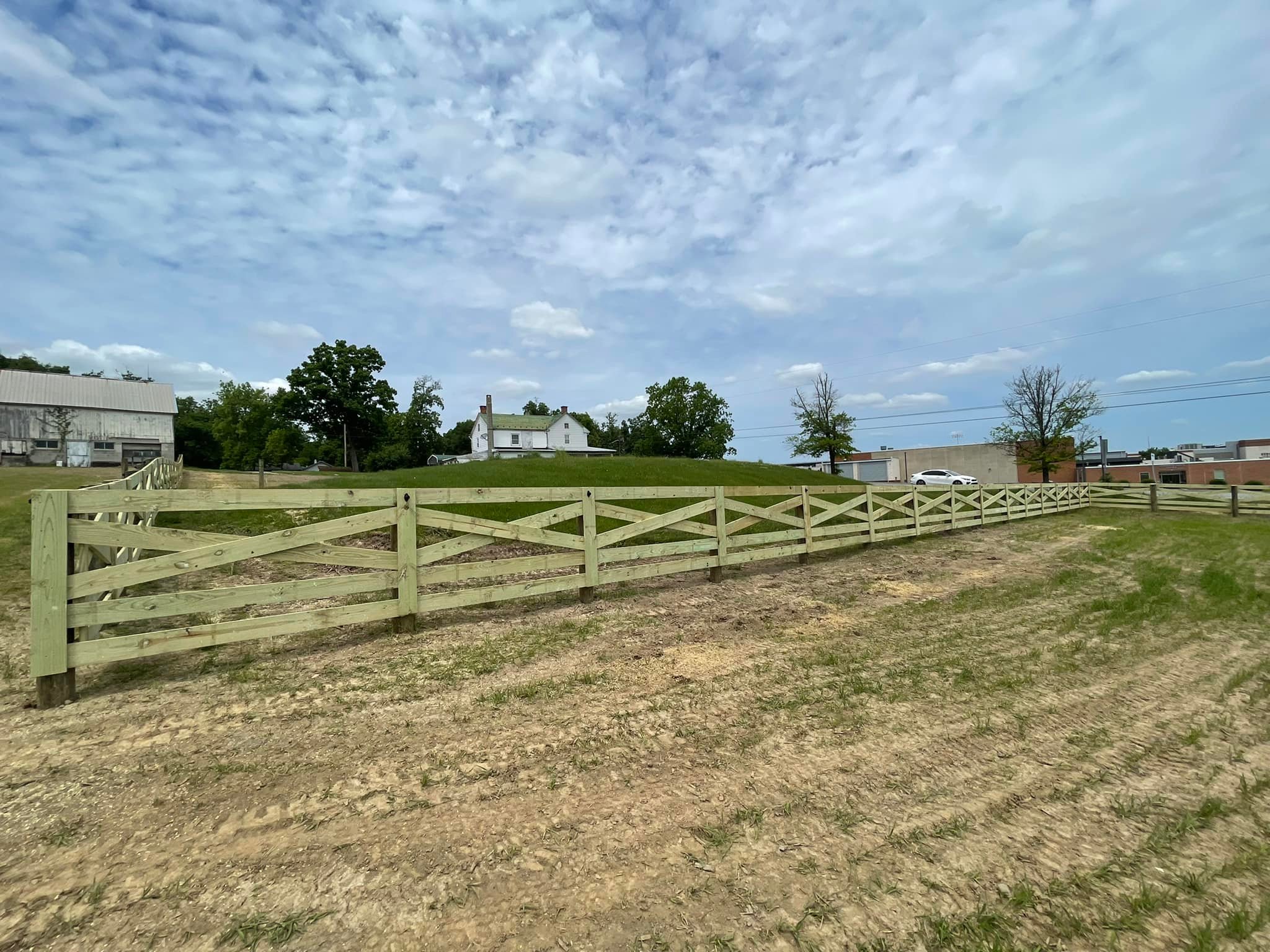 New farm fence installation by Oak and Iron Farm Fence