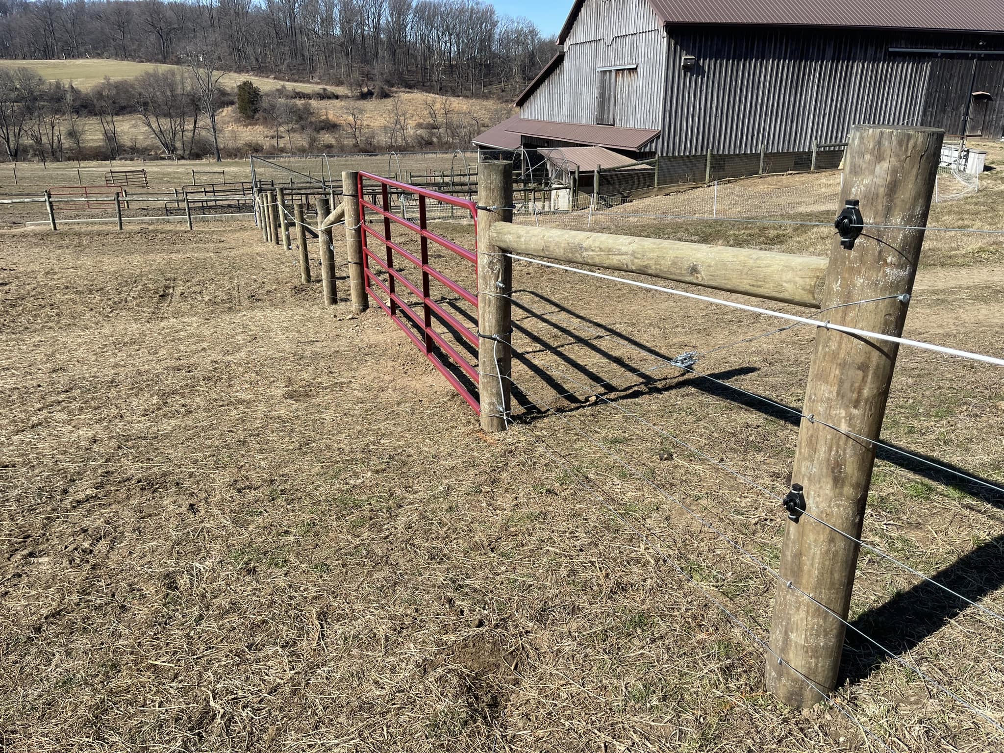 New farm fence installation by Oak and Iron Farm Fence